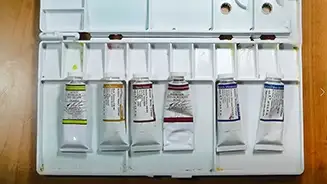 Watercolor pigments and palette